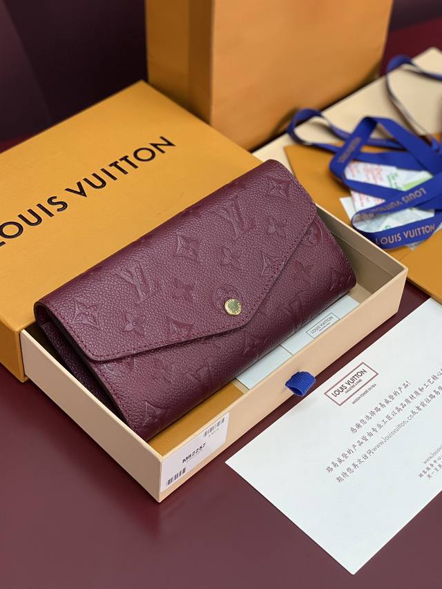 Factory Price P M82257 Purple! This Sarah wallet features Monogram Empreinte lea