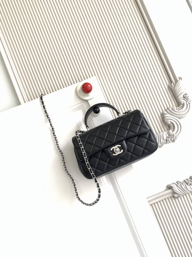 Chanel 21K Latest Mini CF Handle Bag As2431. A classic quilted flap bag with a d