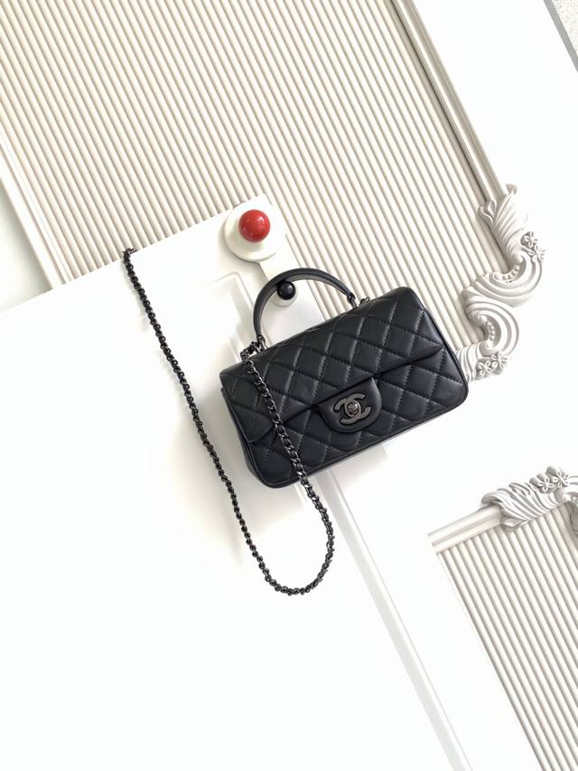 Chanel 21K Latest Mini Cf Handle Bag As2431. A classic quilted flap bag with a d