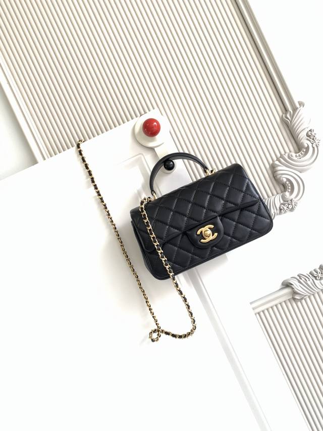 Chanel 21K Latest Mini CF Handle Bag As2431. A classic quilted flap bag with a d