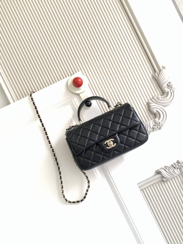 Chanel 21K Latest Mini Cf Handle Bag As2431. A classic quilted flap bag with a d