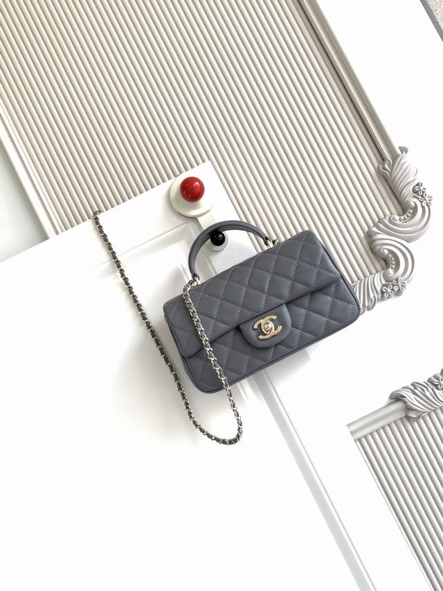 Chanel 21K Latest Mini Cf Handle Bag As2431. A classic quilted flap bag with a d