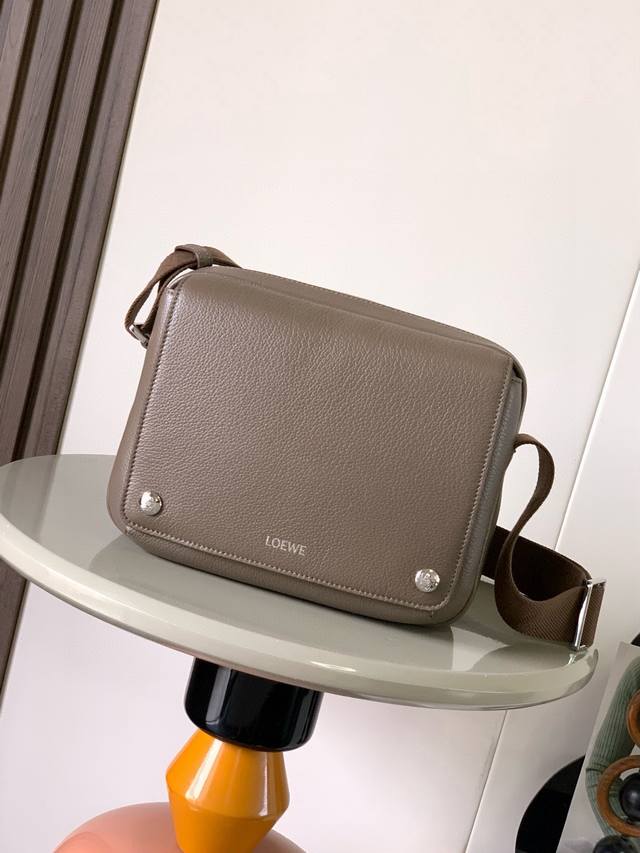 New Extra Small Soft Grained Calfskin Pebble Messenger Bag. The Pebble messenger