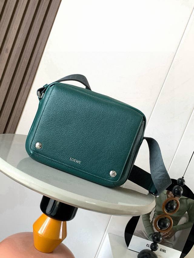 New Extra Small Soft Grained Calfskin Pebble Messenger Bag. The Pebble messenger