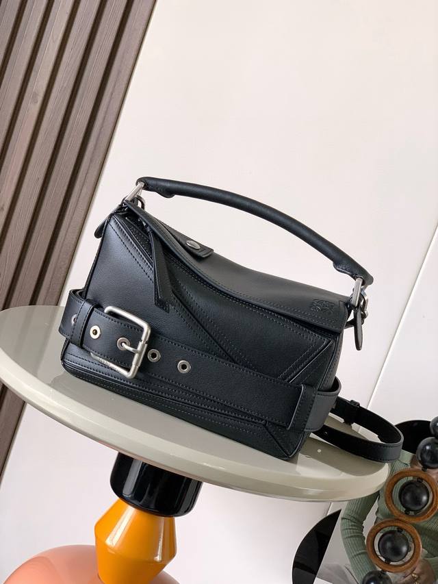 Small Glossy Calfskin Puzzle Biker Bag. The Puzzle features a distinctive geomet