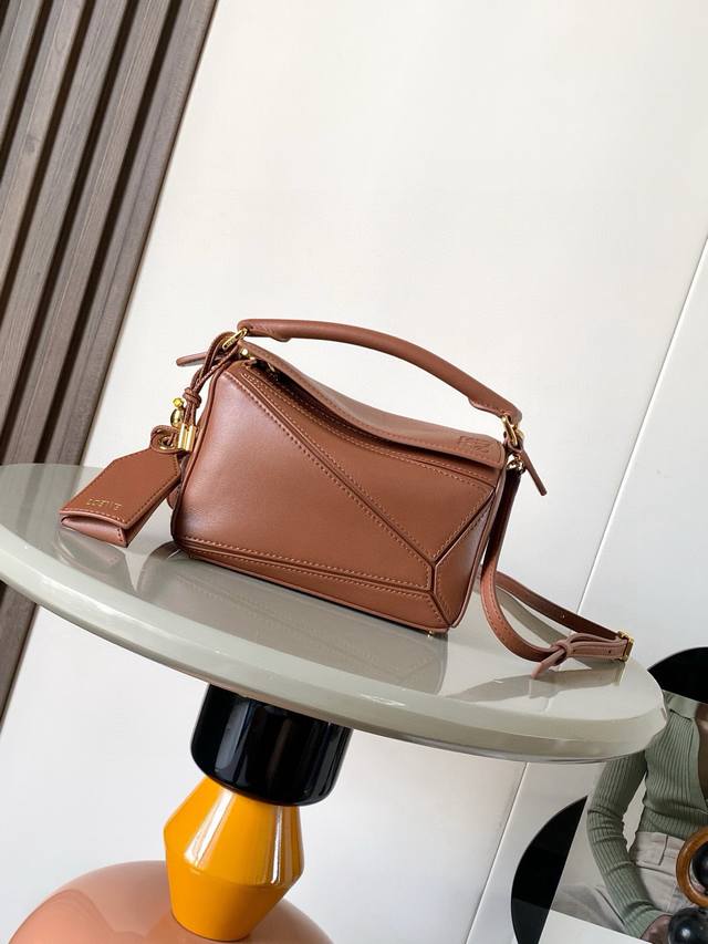 New version of the geometric mini Nappa lambskin Featherlight Puzzle handbag. Ma