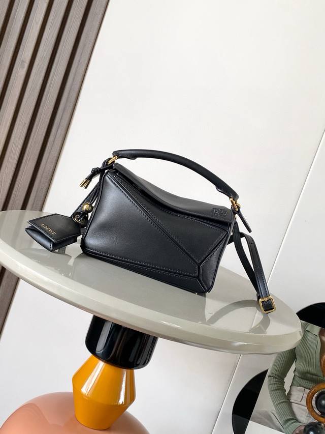 New version of the geometric mini Nappa lambskin Featherlight Puzzle handbag. Ma