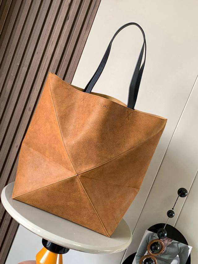 Extra Large Embossed Suede Puzzle Fold Handbag. The Puzzle Fold handbag draws in