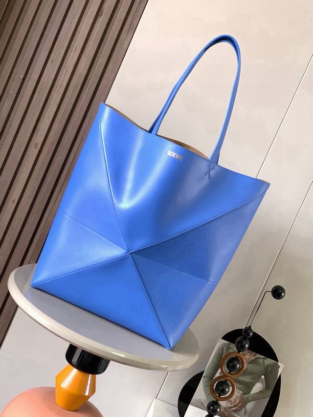 Large New Glossy Calfskin Leather Puzzle Fold Tote Bag. This large tote bag feat