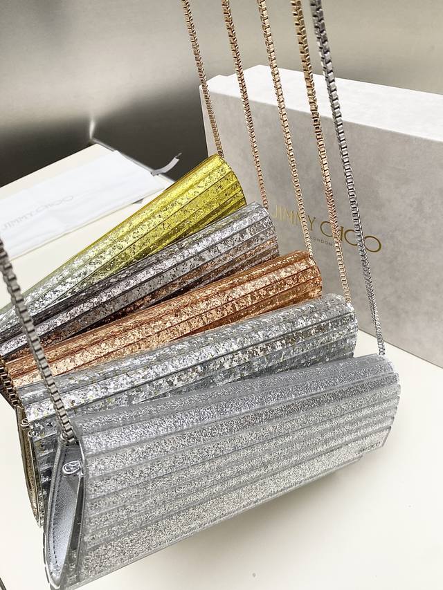 Jimmy Choo Sweetie clutch bag. With its clean lines and smooth, rounded shape, i