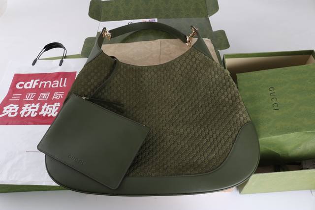 (Large Quantity Price) Description: This handbag combines practicality and time