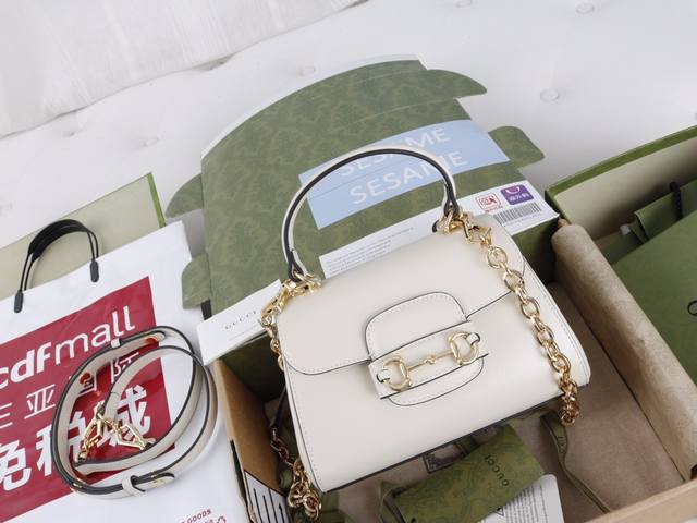 High-volume pricing Introduction: The new 1955 series features leather handbags.