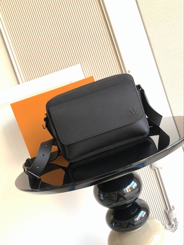 Premium Dynamic Chip Messenger Bag is crafted from lightweight and durable waxed