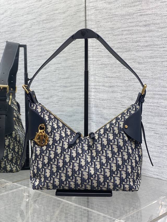 Top-quality original single monogram blue Dior Voyage handbag, in stock. The new