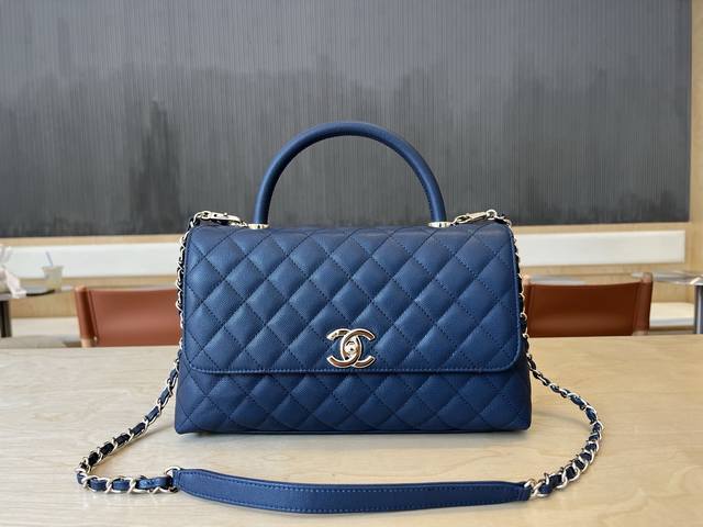 92991 Chanel Cocohandle bag with 14K light gold stitched lining, this season's C