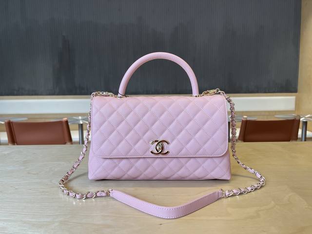 92991 Chanel Cocohandle bag with 14K light gold stitched lining, this season's C
