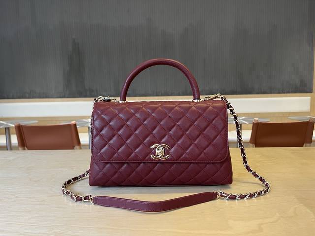 92991 Chanel Cocohandle bag with 14K light gold stitched lining, this season's C