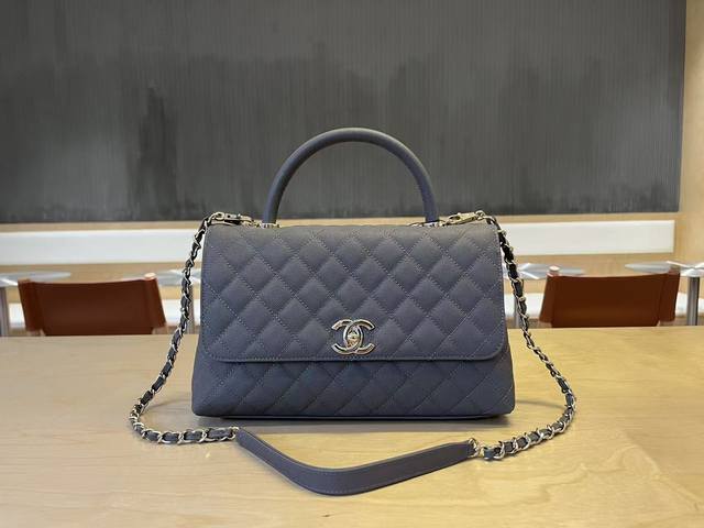 92991 Chanel Cocohandle bag with 14K light gold stitched lining, this season's C