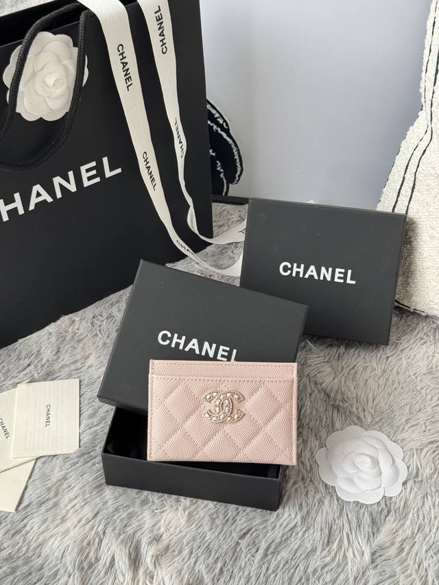 Chanel classic caviar card holder with rhinestones. The double C logo is exquisi