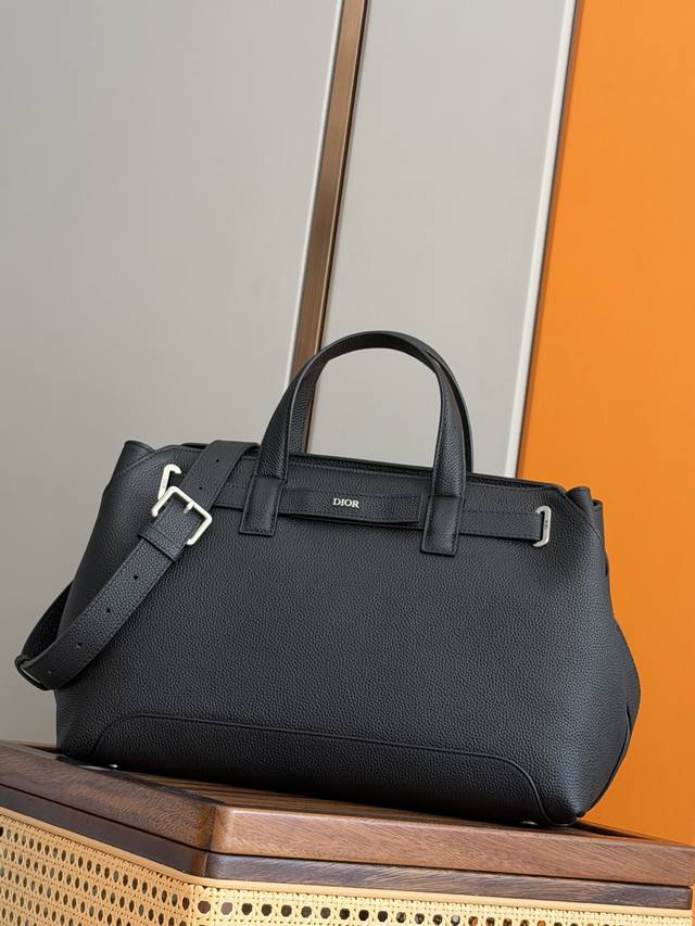 Authentic Ddd. This Dior Normandie handbag seamlessly blends practical design wi