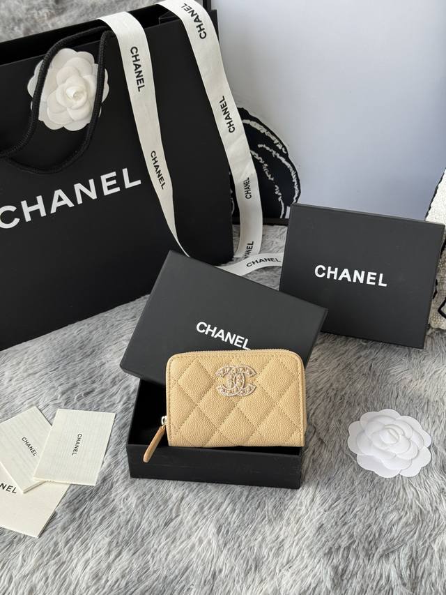 Chanel Classic Black Zippered Caviar Card Holder with Rhinestones. It sparkles i