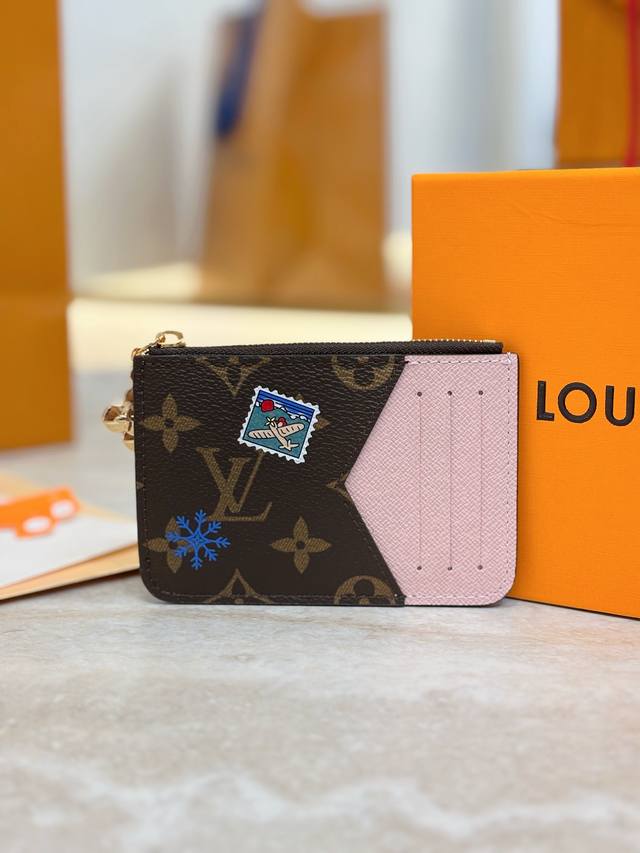 M15333 Christmas Edition Romy Card Holder. This Romy card holder presents a play