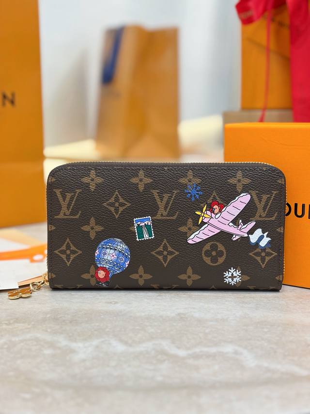 M26256 Christmas Edition Zippy Zipper Wallet. Paying homage to Louis Vuitton's t