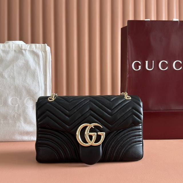 Features the brand's iconic GG Marmont series, crafted with meticulous attention