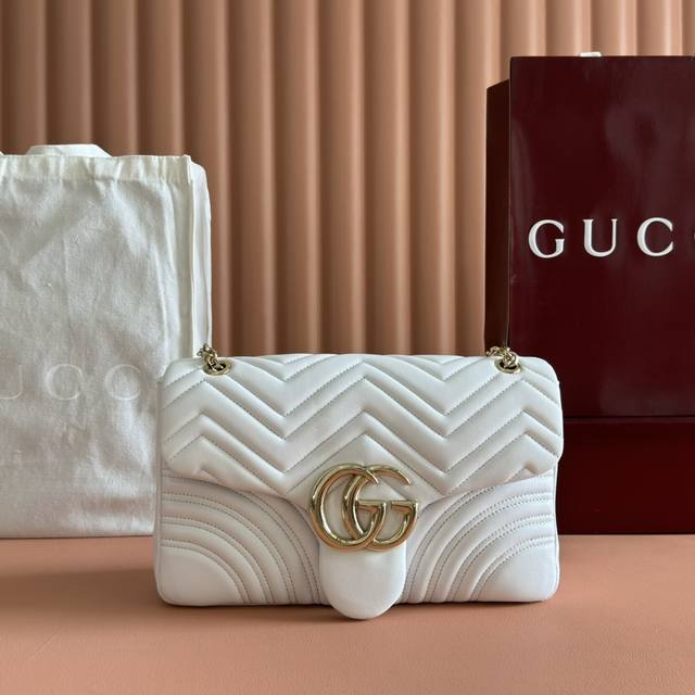 Features the brand's iconic GG Marmont series, crafted with meticulous attention