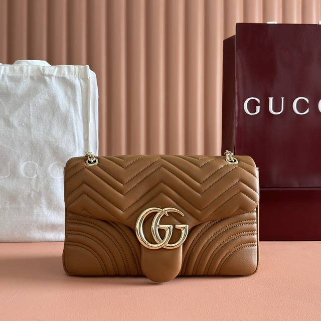 Features the brand's iconic GG Marmont series, crafted with double-G hardware an