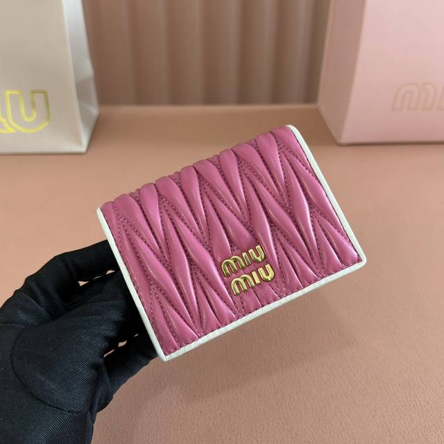 Full set of boutique packaging. Latest version of the Mm pocket wallet, new bout