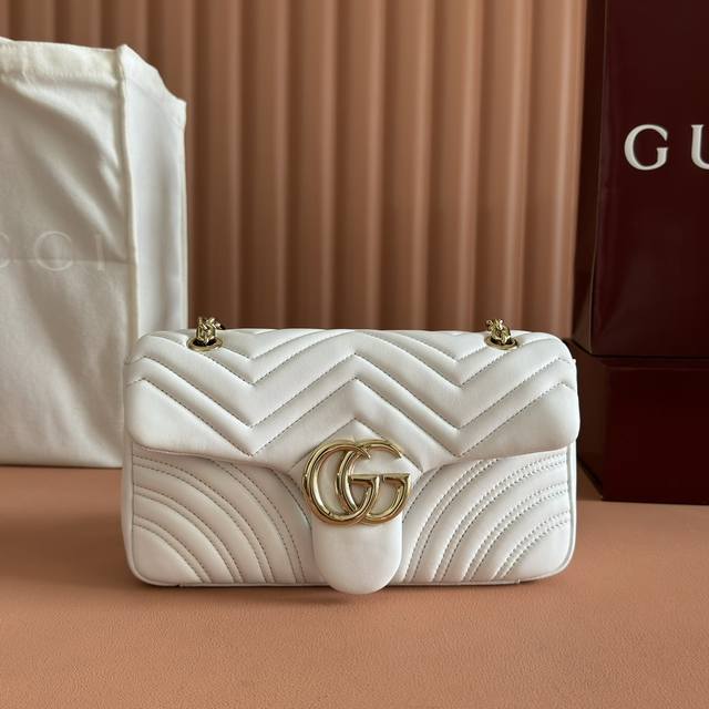 Features the brand's iconic GG Marmont series, crafted with meticulous attention