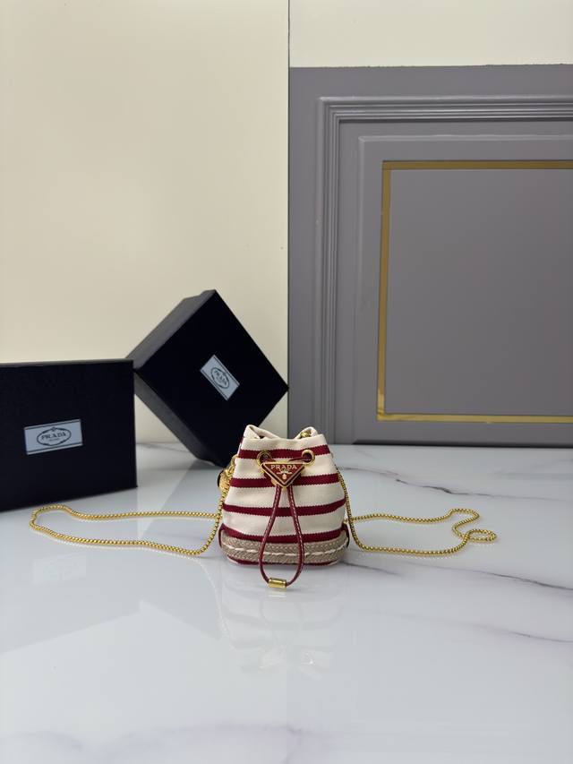 Mini Bucket Bag 1Nr016 Striped Style This mini bag offers a fresh interpretation