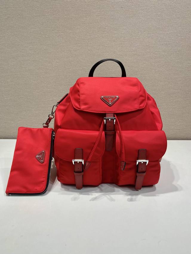 New Backpack 1Bz811, New Color. This nylon backpack features exquisite Saffiano