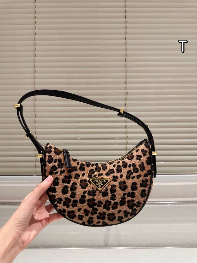 Heard everyone's been looking for Prada leopard print lately? Prada has just lau