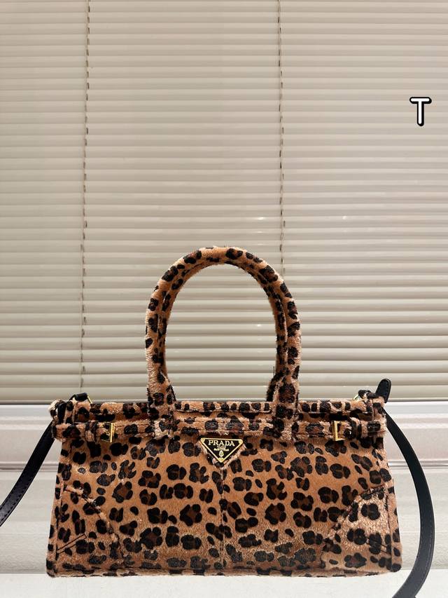Heard everyone's been looking for Prada leopard print lately? Prada has just lau