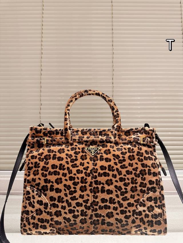 Heard everyone's been looking for Prada leopard print lately? Prada has just lau