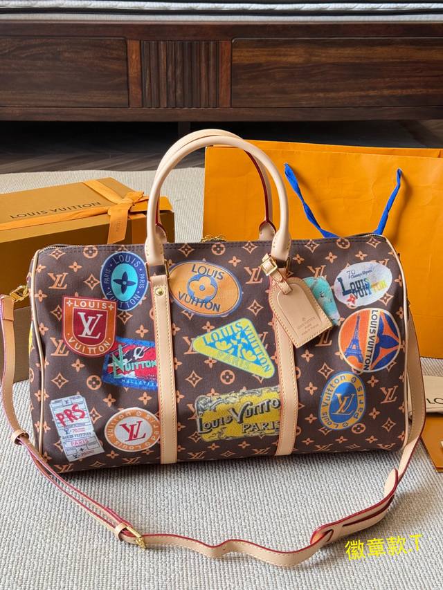 Louis Vuitton Keepall 45 Badge Travel Bag. Featuring classic Monogram canvas an