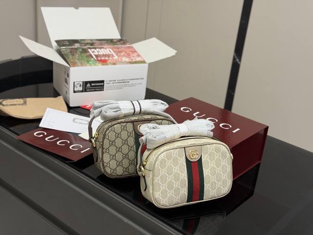 Comes with a folding box/airplane box. This Gucci Ophidia camera bag is absolute