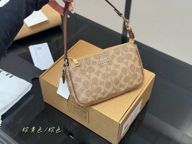 Comes with a box. Size: 19.12cm. Coach Nolita 19 Mahjong Bag. Retains original b