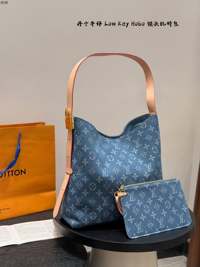 Vintage Low Key Hobo Tote Bag with Box, featuring a classic padlock and adjustab