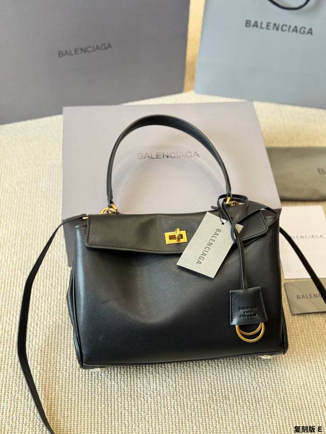 Replica Balenciaga Rodeo Handbag. Made of soft, glossy calfskin with silver hard
