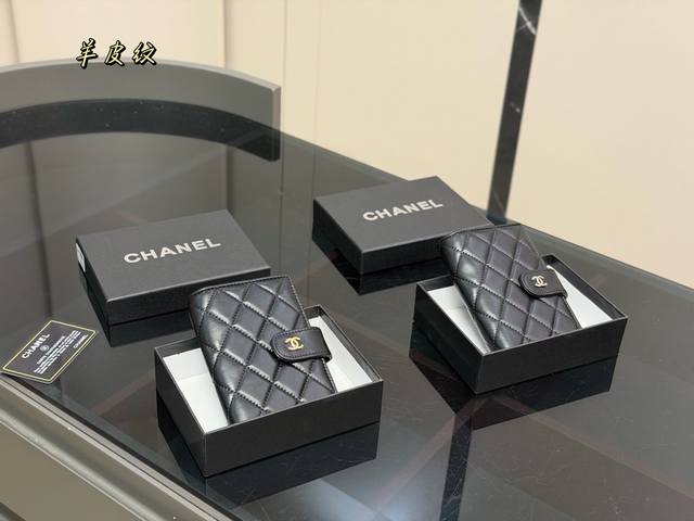 Comes with box. Size: 10.15cm. Chanel medium-length wallet/passport holder. Made
