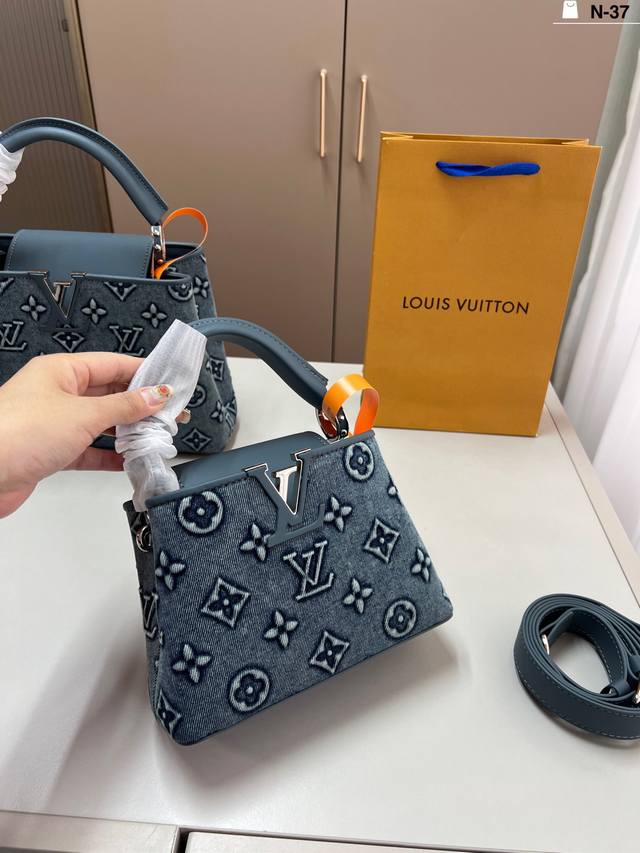 Small LV denim handbag Capucines A must-have for a queenly style. Reasonable siz