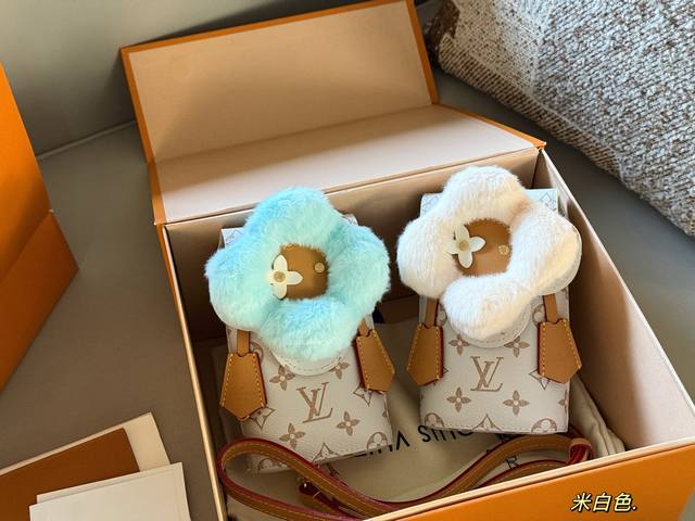 Box included. Size: 10*18cm. Limited edition Louis Vuitton Vivienne phone bag is