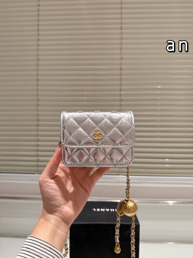 Chanel Mini Woc Waist Bag with Gold Ball. This Chanel Mini Woc waist bag feature
