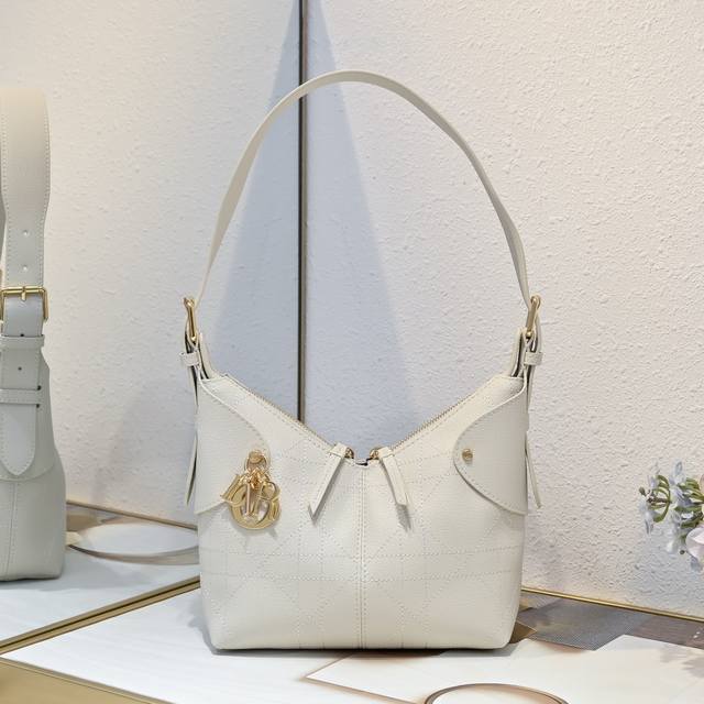 Off-white Small. This Dior Voyage handbag is a new addition to the 2026 Early Sp