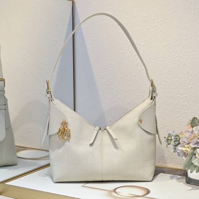 Off-white Large. This Dior Voyage handbag is a new addition to the 2026 Early Sp