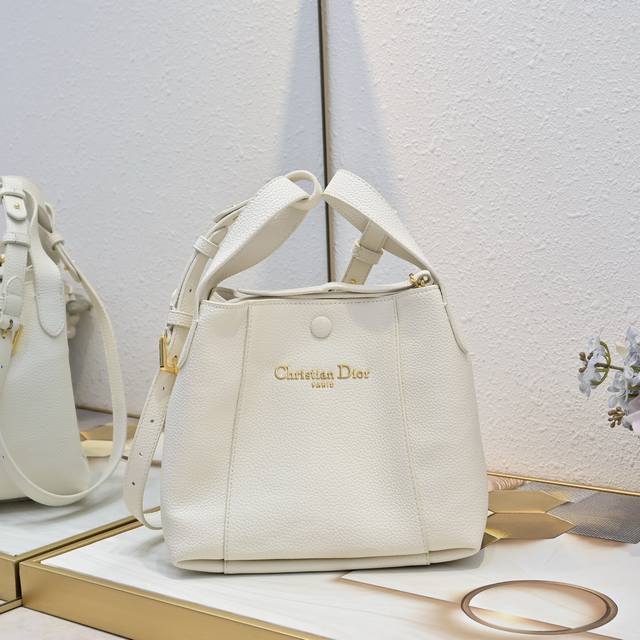 Signature Bucket Bag This Signature bucket bag is a new addition to the Spring/S