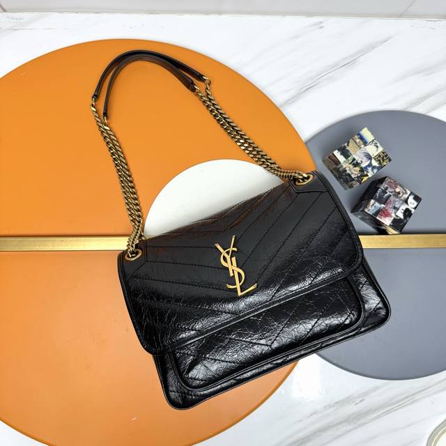 Black and gold label Niki bag - 28cm, crackled texture, a favorite among celebri